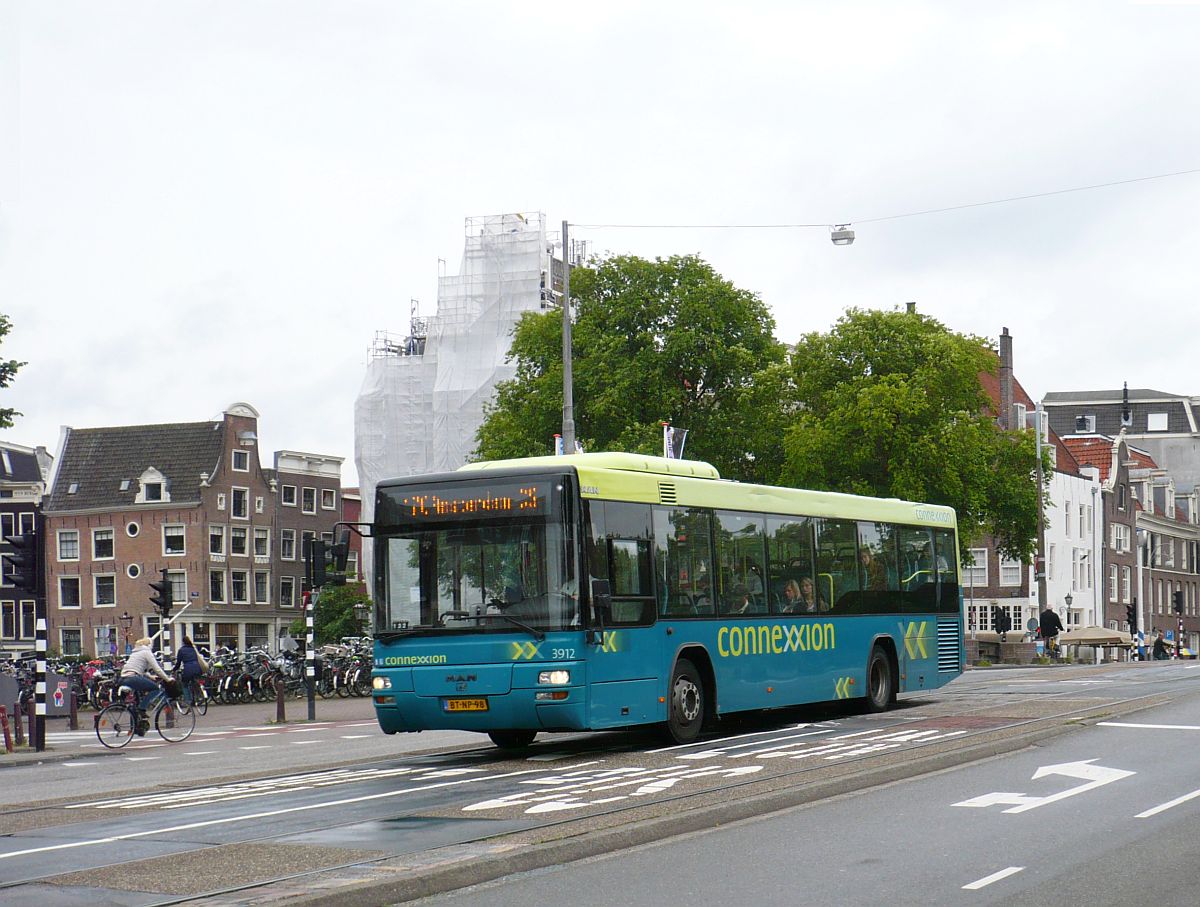 Connexxion Bus 3912 MAN Lion's City Baujahr 2007. Prins Hendrikkade, Amsterdam 04-06-2014.

Connexxion bus 3912 MAN Lion's City bouwjaar 2007. Prins Hendrikkade, Amsterdam 04-06-2014.