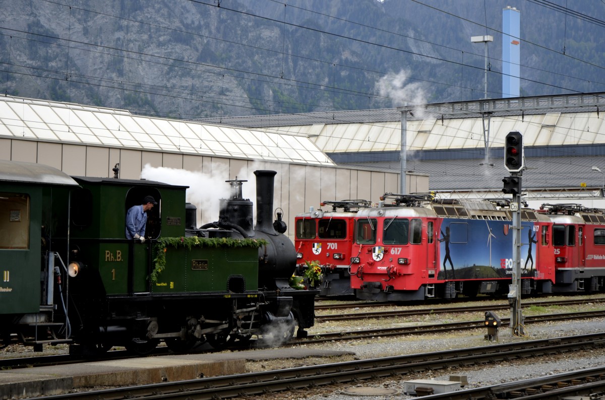 Jubiläum 125 Jahre RhB am 10.05.2014 in Landquart. Die G 3/4 Nr. 1 Rhätia ist nach den Sonderfahrten auf dem Weg ins Depot und trifft dabei auf die  Ge 6/6 II Nr. 701 und die Ge 4/4 II Werbelok Nr. 617 Ilanz  RE POWER .