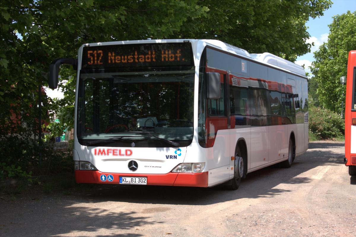 Mercedes Citaro Linienbus am Bahnhof Deidesheim am 31.5.2014.
Bus trgt die Firmenaufschrift Imfeld und fhrt fr VRN.