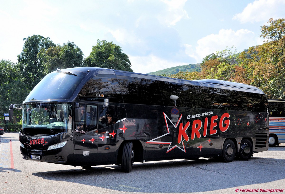 NEOPLAN Cityliner von KRIEG Reisen / Deutschland im August 2013 in Krems gesehen.