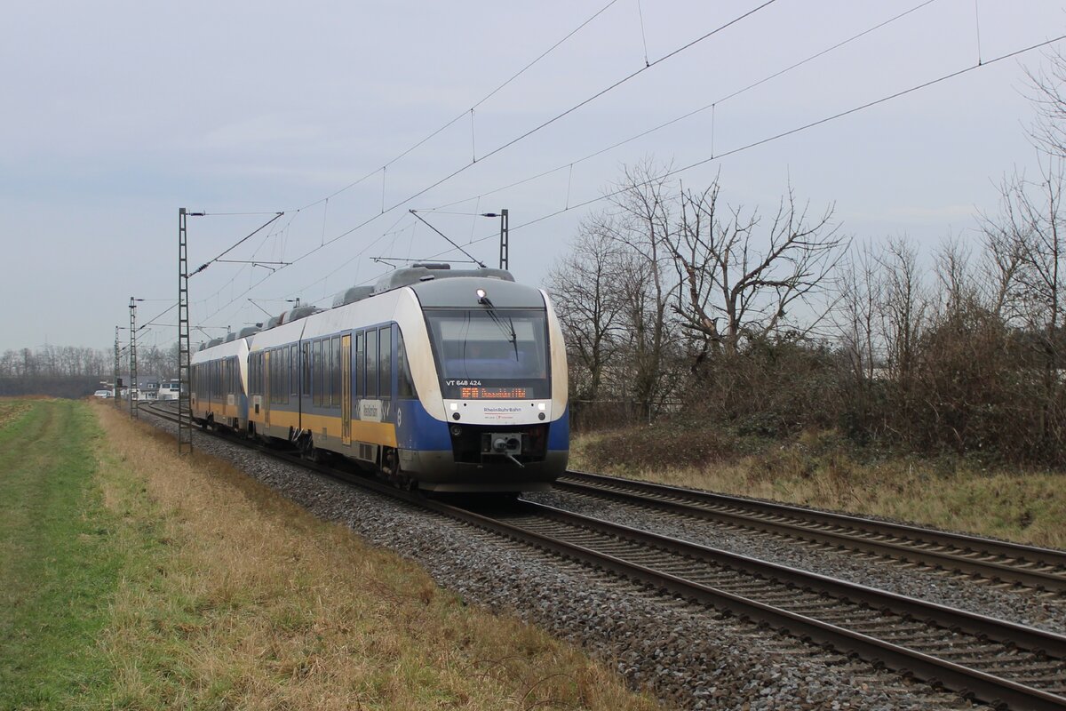 Rhein-RuhrBahn 648 424 passiert der Fotograf am offenbarer Stelle zwischen Krefeld und Neuss am 22 Januar 2025.