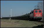 DB Schenker 140 070-2 mit Y-Transport in der Verbindungskurve nach Seddin, noch einmal sch�n von Nah (gesehen Ludwigsfelde Genshagener Heide 07.04.2010)