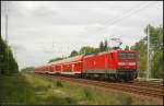DB Regio 112 123 mit dem RE1 Berlin-Charlottenburg f�hrt am 10.05.2012 durch Berlin-Friedrichshagen