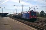 LOCON 482 038-7 in Berlin Sch�nefeld Flugfahen, 20.04.2015    Von SBB Cargo angemietet kam die f�r LOCON Logistik & Consulting AG fahrende Lok mit vier Kesselwagen durch den Bahnhof gefahren