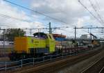 RRF (Rotterdam Rail Feeding) Lok Nummer 106 mit Bauzug, Rotterdam Centraal Station 15-09-2010.