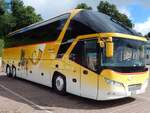 Neoplan Starliner von Postauto aus der Schweiz im Stadthafen Sassnitz am 18.07.2016