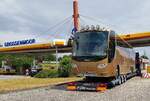 =Scania steht verlastet auf einem Tieflader des schwedischen Abschleppunternehmens JB Bilbärgning.