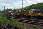 Plasser & Theurer Zweischwellenstopfmaschine 09-32 CSM der  Meterfresser  der Deutsche Gleisbau Union (DGU), Koblenz, abgestellt am 13.05.2012 in Betzdorf/Sieg.