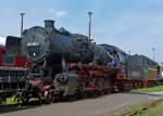 Die Gterzug-Dampflokomotive 50 2988 der WTB (Wutachtalbahn, im Volksmund auch Sauschwnzlebahn genannt), ex DB 052 988-3, steht am 24.08.2013 im Dampflokwerk Meiningen.