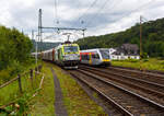 Die an die Dortmunder Eisenbahn GmbH (DE) vermietete SIEMENS Vectron Dual Mode 248 034-1  Phoenix  (90 80 2248 034-1 D-DE) der Captrain Deutschland GmbH fährt am 01 Juli 2024, mit einem Coilzug