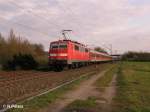 111 202-8 schiebt eine RB Wrzburg bei Thngersheim.