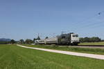 111 029 auf dem Weg nach Salzburg am 18. Juni 2022 bei �bersee am Chiemsee.
