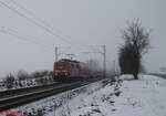 111 187-1 zieht bei Plling den RE50 Mnchen - Regensburg - Nrnberg. 09.12.23