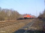 143 868-8 zieht den RE 18211 Cottbus durch Eisenhttenstadt.