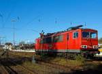 Der Strom-Container 155 038-3 (ex DR 250 038-3) der DB Schenker Rail abgestellt am 28.10.2012 in Kreuztal.