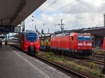 Die 185 029-6 der damaligen DB Schenker Rail (heute DB Cargo AG) fährt am 14 Juni 2013 mit einem ThyssenKrupp Langschienen Zug durch den Hauptbahnhof Koblenz in Richtung Mainz.