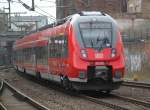 Der Rostocker Hamster 442 348 als RE7(RE 4375)von Wismar nach Ludwigslust bei der Ausfahrt im Schweriner Hbf.28.03.2015