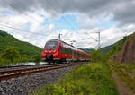   Der vierteilige Bombardier Talent 2 - 442 700 / 442 200  Hatzenport , als RB 81  Moseltalbahn  (Trier – Cochem – Koblenz), fhrt am 30.04.2018 durch Mden (Mosel) in Richtung Koblenz.