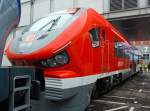   Durch die GAMA etwas verdeckt, der Dieseltriebwagen PESA LINK DB 631-001 (95 80 0631 001-4 D-DB ABpd) ein Vorserienfahrzeug das auf der InnoTrans 2014 in Berlin (26.09.2014) vorgestellt wurde.