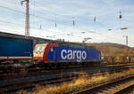 Die SBB Cargo Re 482 024-7 (91 85 4482 024-7 CH-SBBC) fährt am 20.02.2021 mit einem KLV-Zug durch Siegen (Kaan-Marienborn) in Richtung Norden bzw. Giersbergtunnel. Nochmal einen lieben Gruß an den netten Lokführer zurück.

Die TRAXX F140 AC1 wurde 2003 von Bombardier in Kassel unter der Fabriknummer 33590 gebaut und an die SBB Cargo AG geliefert. Sie hat die Zulassungen und Zugbeeinflussungssysteme für die Schweiz und Deutschland.
