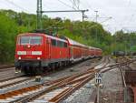   Die 111 151-7 der DB Regio NRW fährt am 27.04.2014 mit dem RE 9  Rhein-Sieg-Express  (Aachen-Köln-Siegen) in den Bahnhof Betzdorf/Sieg ein.