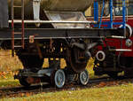 Detailbild Rollbock vom System Langbein, darauf eine Achse eines normalspurigen Wagens, bei einer der beiden Rollbockgruben (Umspuranlage) der meterspurigen Museumsbahn Alp-Bähnle