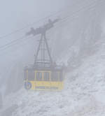 In den Wolken .......
Eine Gondel der Wendelstein-Seilbahn erreicht am 28.12.2016 bald im Nebel bei minus 6 Grad Celsius die Bergstation am Wendelstein auf 1.724 m über NN. Der Wendelstein selbst hat eine 1.838 m.

Während man hier oben bereits bei Frost in den Wolken war, so war es im Tal warm und klar. 

Bei der Bildbearbeitung habe ich sehr darauf geachtet, das Bild so herüberzubringen wie wir es sahen. Mit der Automatik des Programmes könnte man es auch klar aussehen lassen.