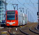 Triebwagen 4052 mit 4012 der KVB  (Klner Verkehrsbetriebe AG), Line 1 nach Junkersdorf, kommt hier am 26.03.2013 von der Deutzer Brcke zum Heumarkt hinab.