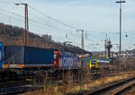 Während die SBB Cargo Re 482 024-7 (91 85 4482 024-7 CH-SBBC) am 20.02.2021 mit einem KLV-Zug durch Siegen (Kaan-Marienborn) in Richtung Norden zieht, kommt ihr ein Alstom Coradia LINT 41 der