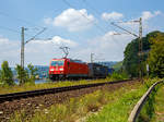   Die 185 269-8 (91 80 6185 269-8 D-DB) der der DB Cargo fährt am 07.07.2018 mit einem Containerzug durch Neuwied-Feldkirchen in Richtung Süden.