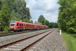 612 571 + 104 mit einen umgeleiteten IRE Franken-Sachsen-Express 3088 Dresden - Nrnberg bei Schnfeld.