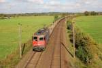 SBB Cargo 421 389-8 kommt mit einen halbvollen Neu Schwellenzug aus Richtung Maschen auf der Güterumgeung am 14.10.2014 bei Ramelsloh.