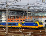 Die NS 186 119 (91 84 1186 119-1 NL-NS) erreicht am 31 Mrz 2018 mit einem IC (InterCity) den Bahnhof Amsterdam Centraal.