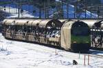 Etwas in gegenlicht: am 1 Jänner 2025 steht BLS 465 012 mit der PKW Zug in Kandersteg Autoverlade.