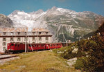 MGB/FO: Die herrliche Aufnahme der HGe 4/4 I - 32 in Brig von Armin Schwarz erinnerte mich sehr stark an das Jahr 1981, als ich eine HGe 4/4 I bei der Einfahrt Gletsch, zusammen mit dem Rohnegletscher