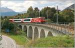 Kurz nach Segnas kommt bereits die MGB HGe 4/4 II N° 5  Mount Fuji  mit dem Glacier Express 902 aus Zermatt und konnte kurz vor der Einfahrt in den letzten Zahnstangenabschnitt auf dem Viadukt über das Val de Cuoz  fotografiert werden. 

16. Sept. 2020
