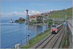 Während der SBB RABe 523 110 und ein weiterer bei Rivaz in Richtung Lausanne fahren, legt der CGN Raddampfer  Itailie  an der Schiffsanlegestelle Rivaz St-Saphorin an. 

28. Mai 2024
