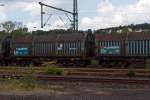 Drehgestellflachwagen fr Coiltransporte mit vier Radstzen, verschiebbaren Teleskophauben und Lademulden (Shimmns) der SBB (CH), hier am 17.08.2011 in Scheuerfeld/Sieg.