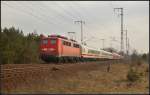 DB Fernverkehr 115 198 mit dem Pbz nach Bln.-Lichtenberg am 09.04.2013 in der Berliner Wuhlheide.