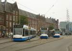 GVBA TW 2117, 2092 und 2005 Stationsplein, Amsterdam Centraal Station 25-09-2013.